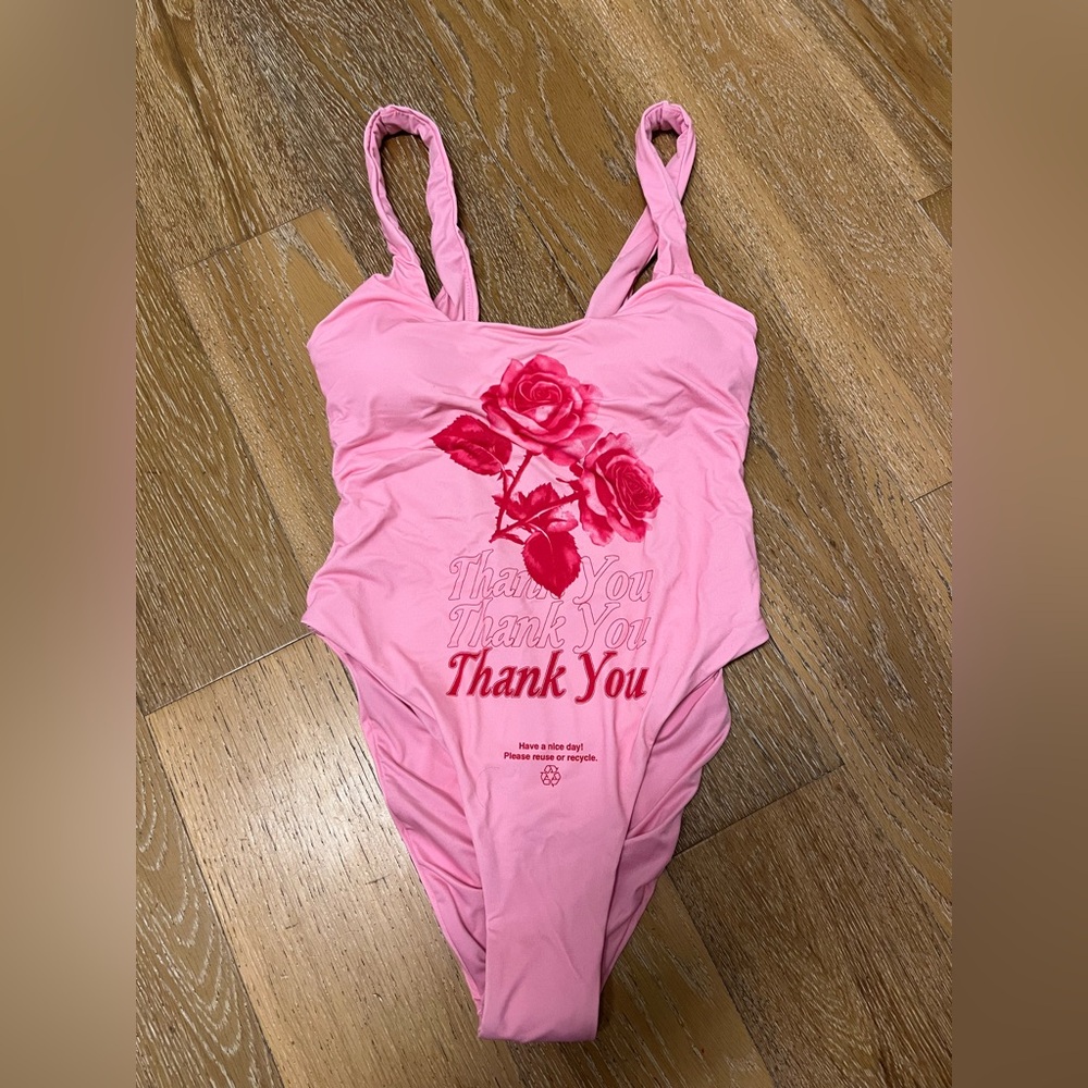 Out from under Urban Outfitters Pink Rose swimsuit
